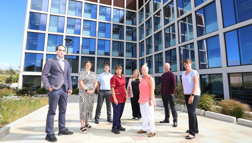 A photograph of The lab team outside the Biosphere, Newcastle Helix