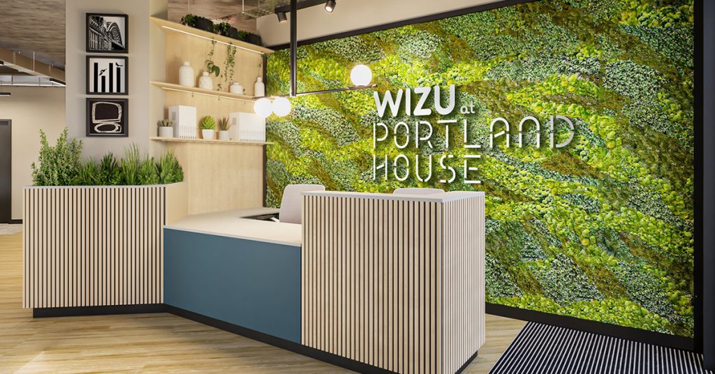 A photograph of the dedicated reception area within Wizu at Portland House.
