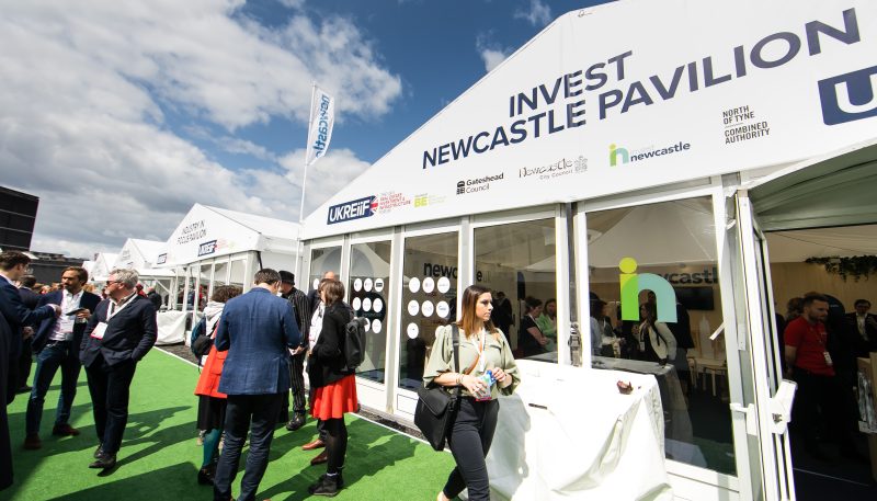 Image of the outside of the Invest Newcastle Pavilion tent at UKREiiF 2023