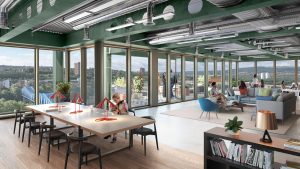 CGI of upper floor office space in new environmentally-friendly office building, there are people working at large shared desk and comfortable seating near the windows.