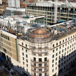 Aerial image of Pilgrim's Quarter development site, some of the structure still has scaffolding on the external walls.