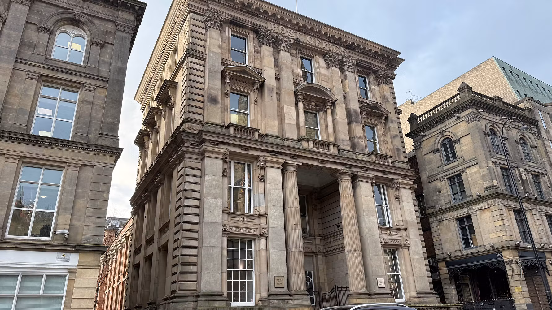 Image of Old Post Office building with Georgian-style facade.